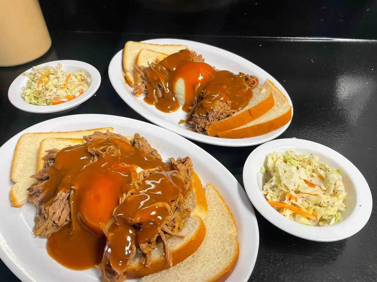 Open-faced country-style meals with gravy and slaw